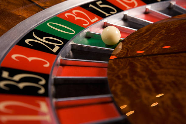 Roulette wheel spinning with live dealer